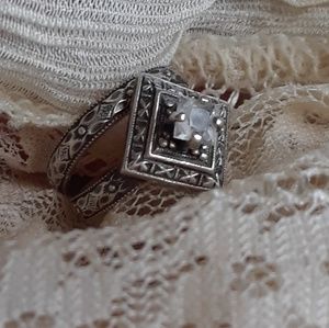 Oxidized sterling silver and white topaz ring